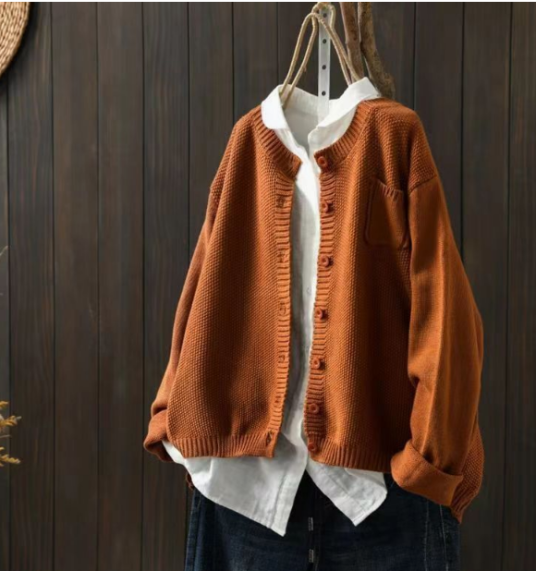 Chic women's oversized button-up long-sleeve cardigan. A must-have for fall & winter fashion, perfect for layering.