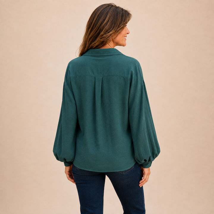 Chic women's relaxed fit button-down blouse, a stylish choice for daily wear.
