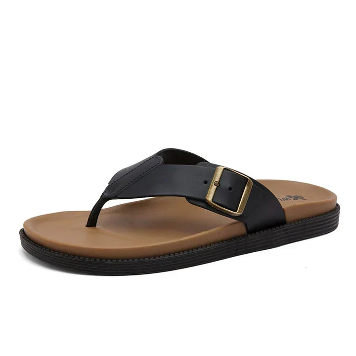 Modern men's thong slides with stylish buckle. Comfortable open-toe design, great for pool slides & summer footwear.