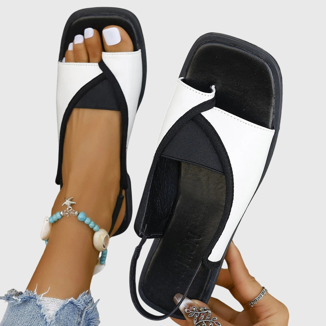 Stylish women's square toe slingback flat sandals, ideal for summer vacations & casual outfits. Open toe comfort.