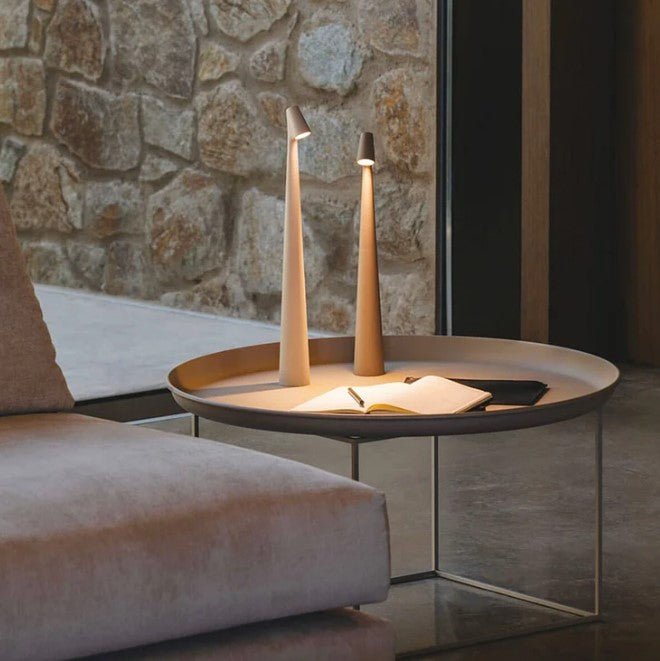 Wireless minimalist LED table lamp with ambient light & dimming for modern home decor.