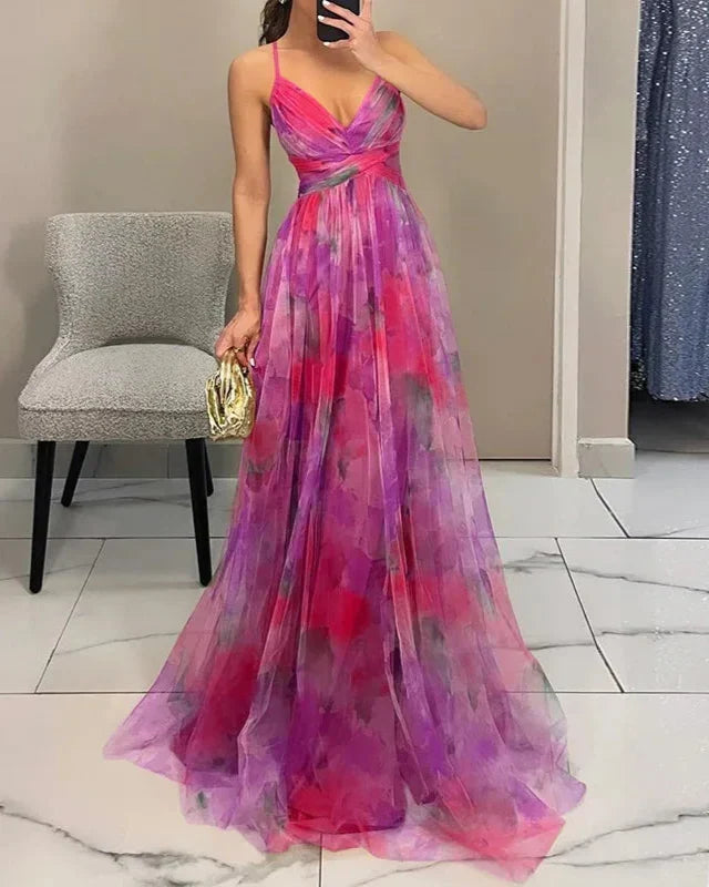 Stylish spaghetti strap V-neck maxi dress for women, with a beautiful flowing watercolor pattern.