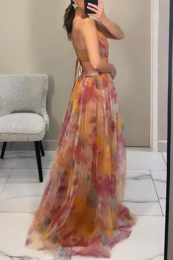 Women's elegant V-neck spaghetti strap maxi dress, designed with a flowing A-line cut and watercolor motif.