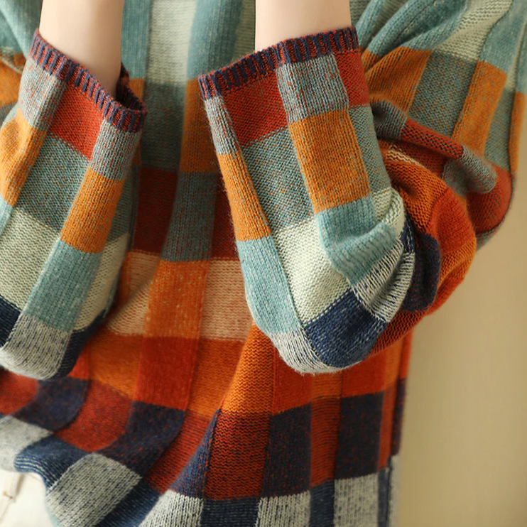 Stylish Aurora cashmere turtleneck sweater for women. Chic winter fashion, warm & comfortable wear.