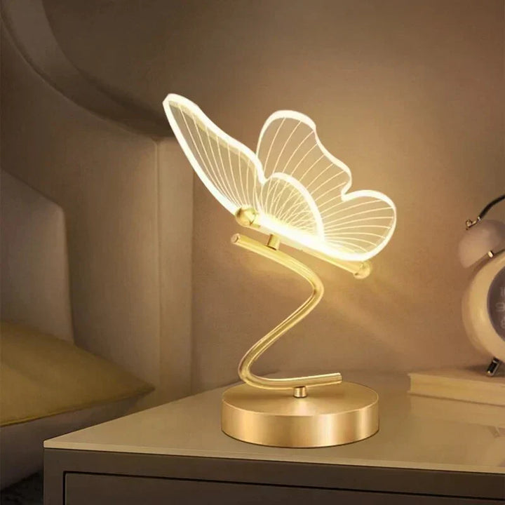 Modern butterfly LED table lamp. Elegant decorative accent light, perfect for contemporary home decor in living rooms or bedrooms.