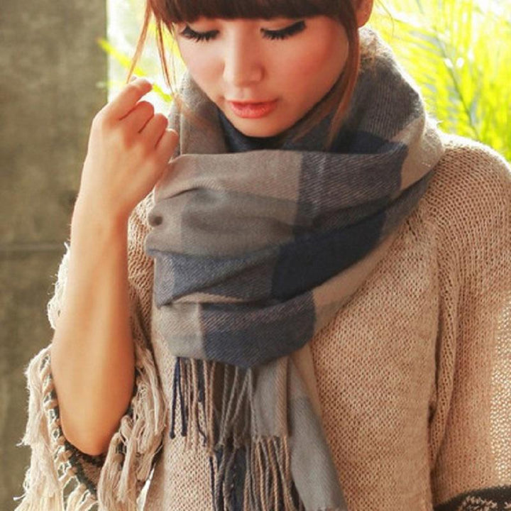 Deluxe women's cashmere check scarf, a stylish and warm accessory for cold weather.