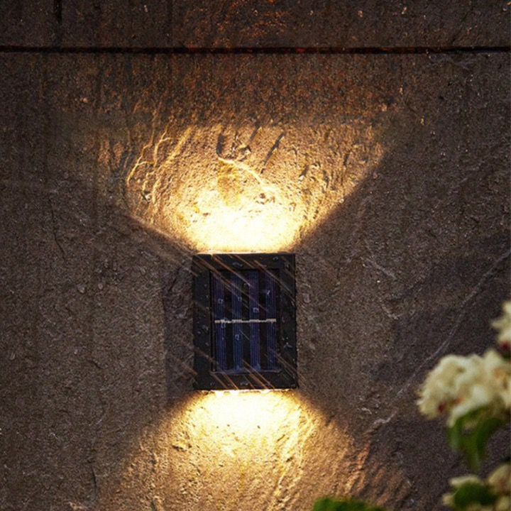 Stylish wireless solar LED wall lamp for outdoor lighting. Perfect for garden decor, patio security, & exterior illumination.