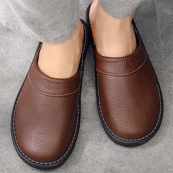 Men's ergonomic comfort clog slippers for ultimate home relaxation and support.
