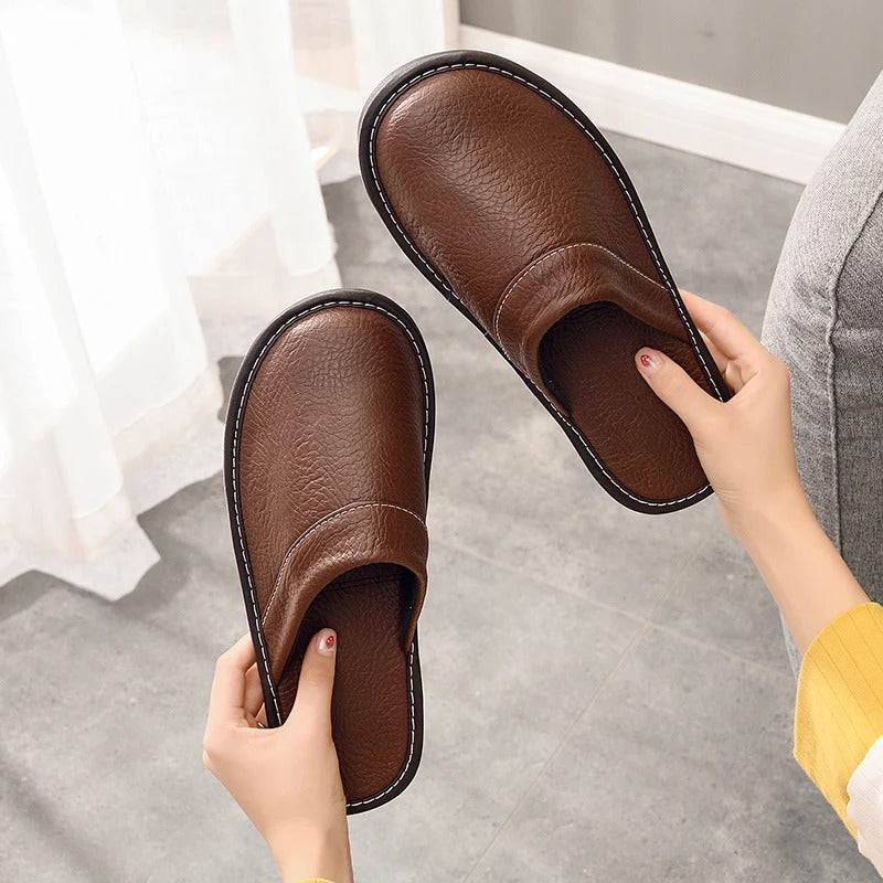 Plush men's ergonomic slippers, supportive and soft for luxurious home loungewear.