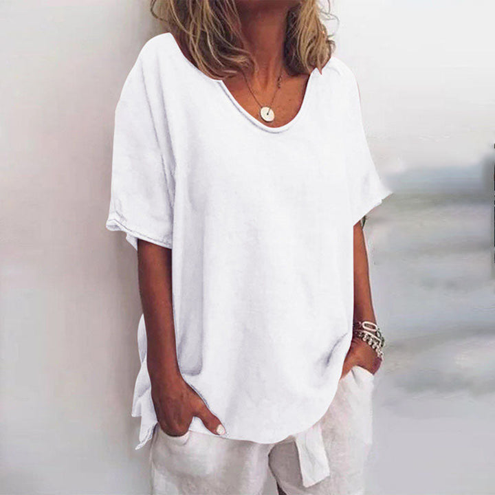 Comfortable women's oversized V-neck tee with dropped shoulders, perfect for loose fit summer fashion.