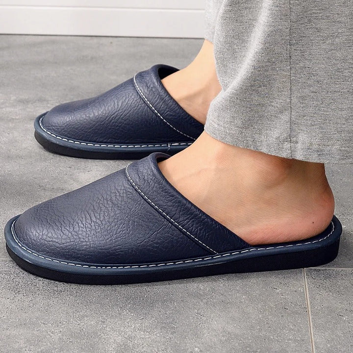 Close-up of plush men's ergonomic comfort clog slippers, highlighting soft interior.