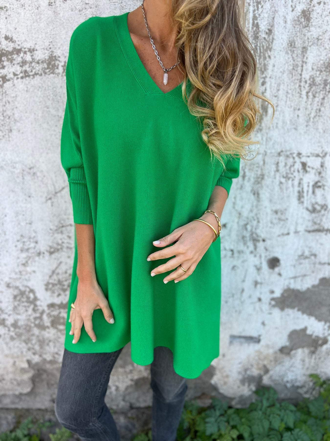 Women's loose fit oversized V-neck knit top, perfect for casual layering and comfort.