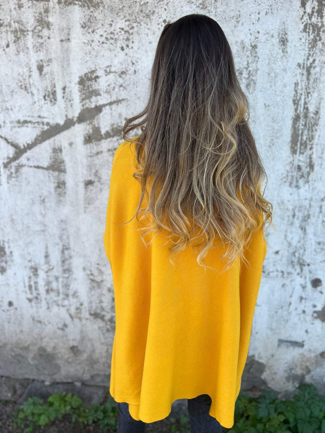 Soft knit V-neck oversized long sleeve top for women, ideal for a relaxed loose fit.