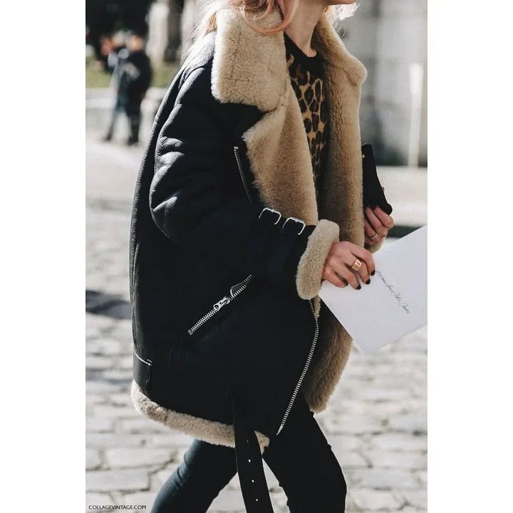 Trendy women's warm belted fashion jacket, perfect for winter with its chic design and useful pockets.
