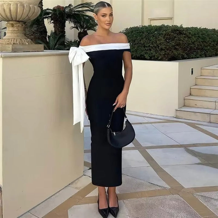 Sophisticated women's off-shoulder midi evening dress. Ideal formal gown for elegant events.