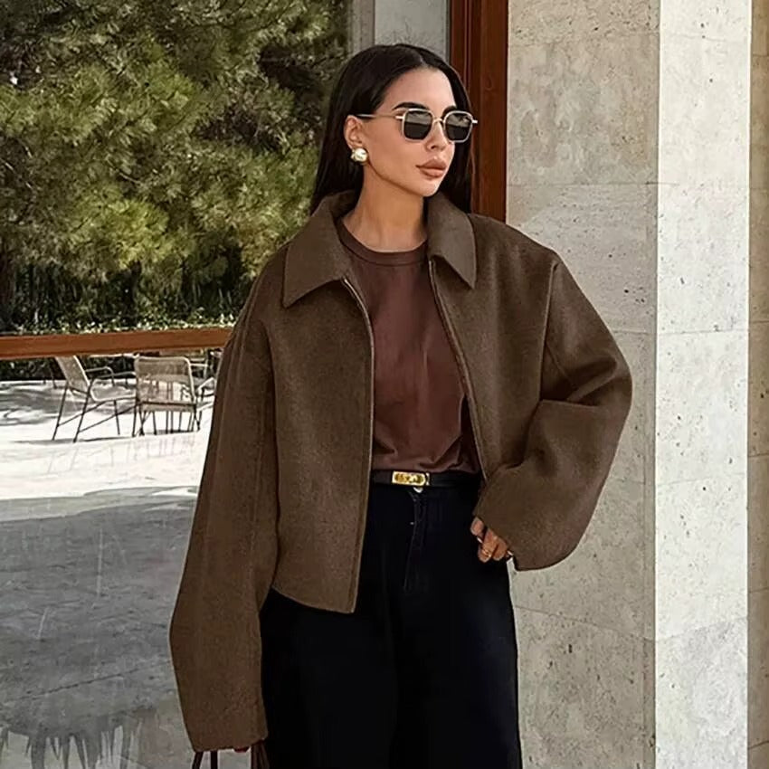 Stylish women's jacket with zipper closure & classic collar, great for fall fashion & winter layering.
