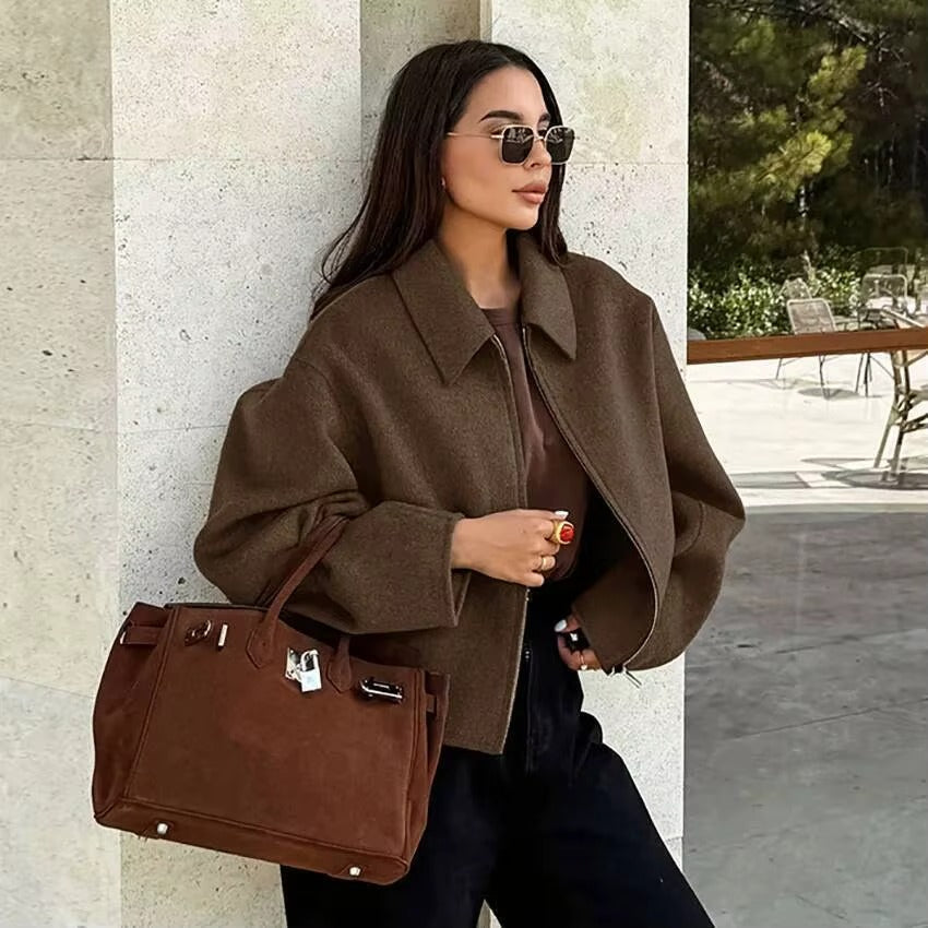 Modern women's outerwear, a chic zipper collar jacket for casual occasions & transitional weather.