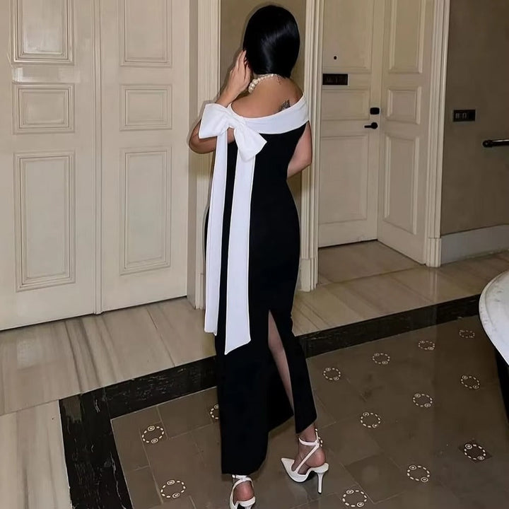 Chic women's off-shoulder midi formal dress. An elegant evening gown for cocktail parties.