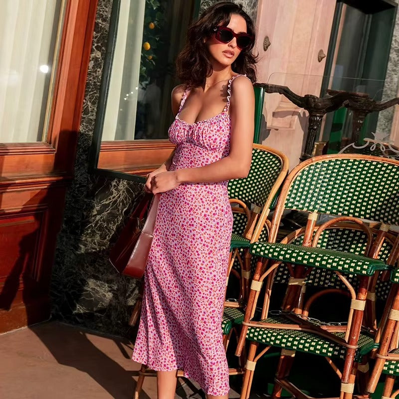 Casual women's floral midi dress with ruffle straps, a comfortable day dress for summer outings.
