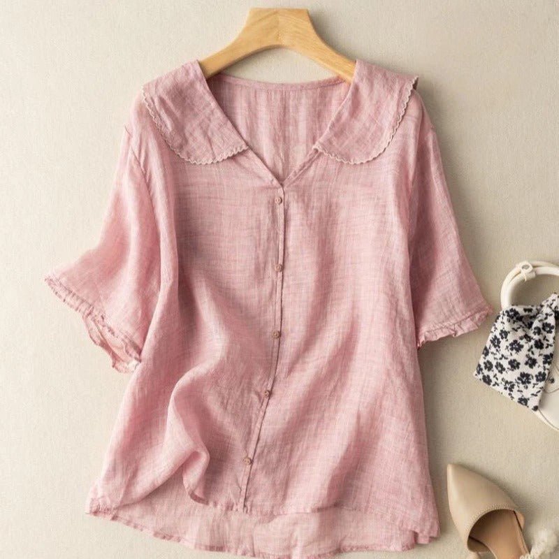 Scalloped collar button-up women's blouse. A versatile half-sleeve top for elegant office wear or casual summer style.