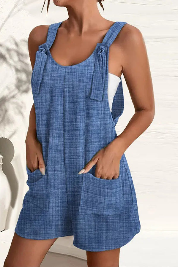Casual women's summer jumpsuit with pockets, wide leg, multicolored pattern, offering effortless comfort.