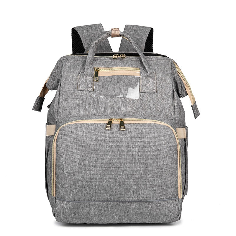 Travel-friendly baby backpack featuring a foldable bassinet and waterproof design for parents.