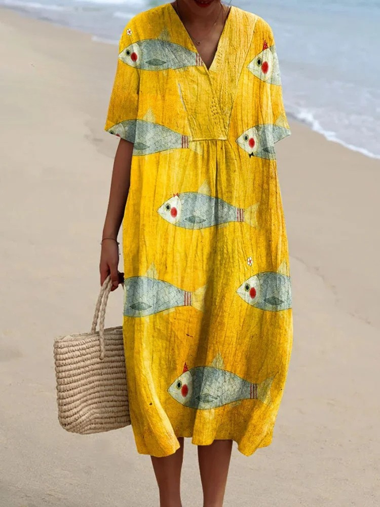 Women's yellow fish print relaxed midi dress with V-neck & short sleeves, ideal for summer casual & vacation wear.