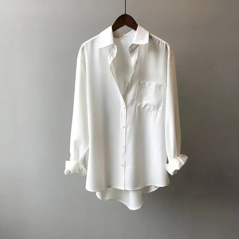 Women's versatile long sleeve button-up blouse. Relaxed fit top, ideal for everyday casual style or office wear.
