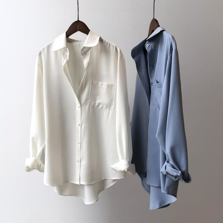 Elegant women's long sleeve button-up blouse. A versatile collared top suitable for daily wear and office outfits.