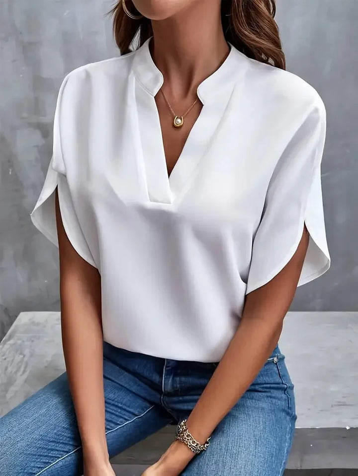 Women's V-neck blouse, short sleeve, relaxed fit. Effortless style & daily comfort for casual wear.