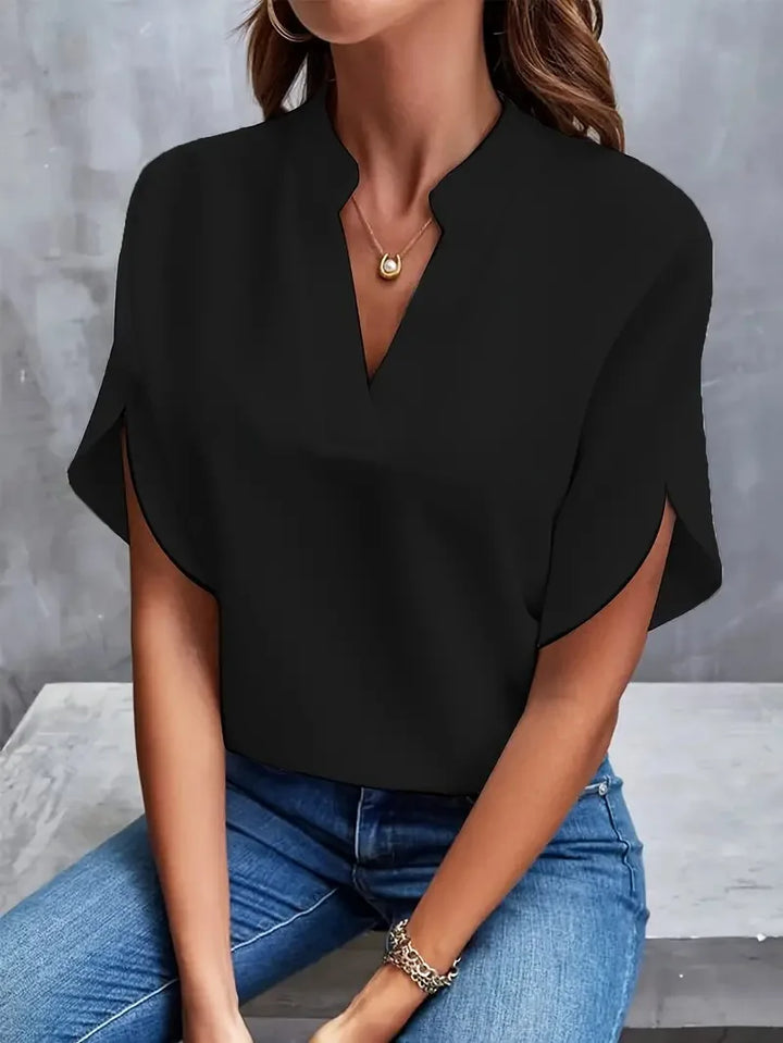 Relaxed fit short-sleeve V-neck blouse for women. Ideal for summer fashion, daily comfort, and casual chic style.