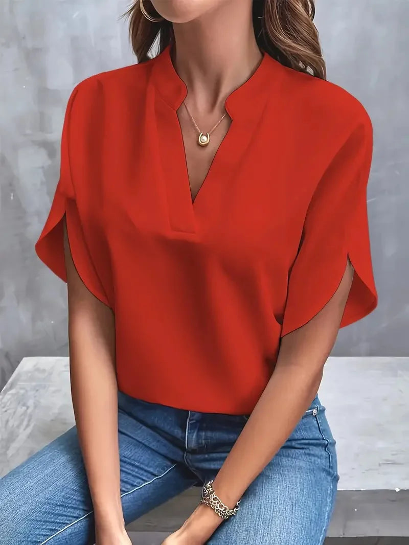 Soft & comfortable women's V-neck blouse, short sleeve. Relaxed fit, perfect for casual elegance or stylish daily wear.