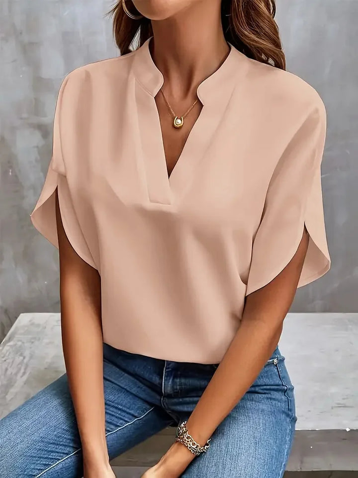 Versatile women's V-neck blouse with short sleeves. Effortless relaxed fit for everyday comfort & chic style.