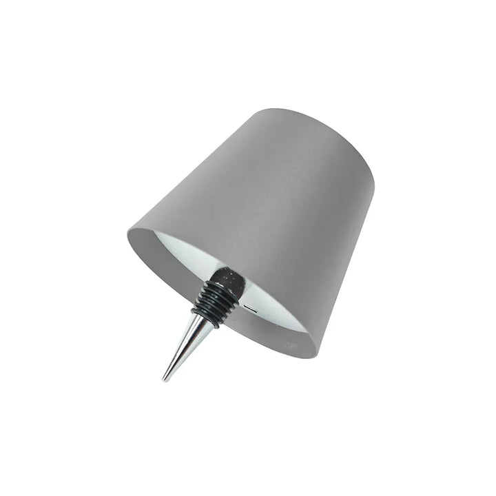 Sustainable LED bottle lamp cap, using rechargeable light to upcycle glass bottles beautifully.