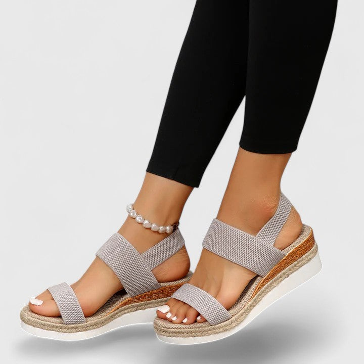 Lightweight women's walking sandals, orthopedic design for arch support and foot relief.