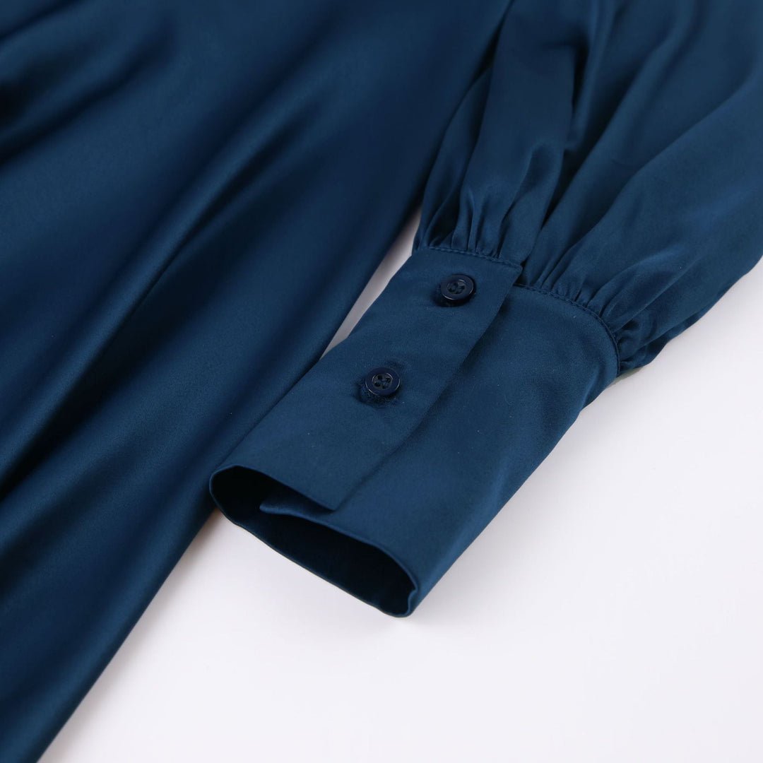 Flattering dark blue formal midi dress, versatile evening wear for women.