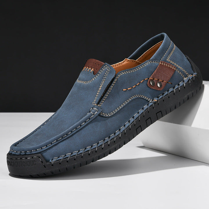 Mens comfort slip-on shoes with arch support & cushioned sole for walking, all-day foot support.