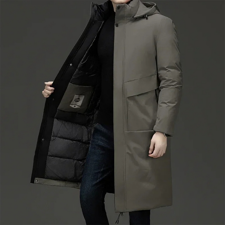 Stylish men's warm hooded longline winter coat for cold weather. Perfect men's fashion outerwear.