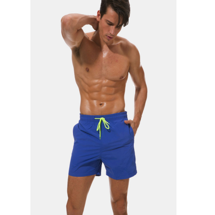 Comfortable men's quick-dry swim shorts, ideal for relaxed summer days & active wear.