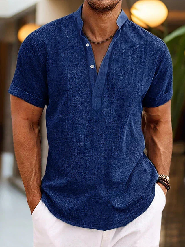 Comfortable men's summer Henley shirt with short sleeves. Breathable fabric for a relaxed, stylish look.