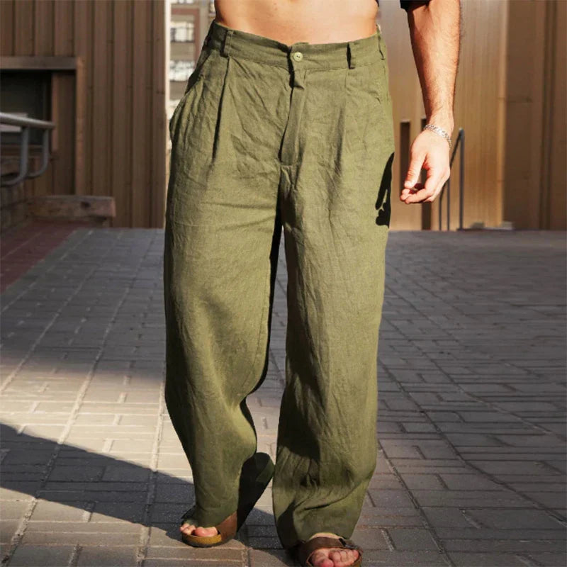 Black wide leg loose fit pleated casual pants for men, offering comfortable & versatile style.