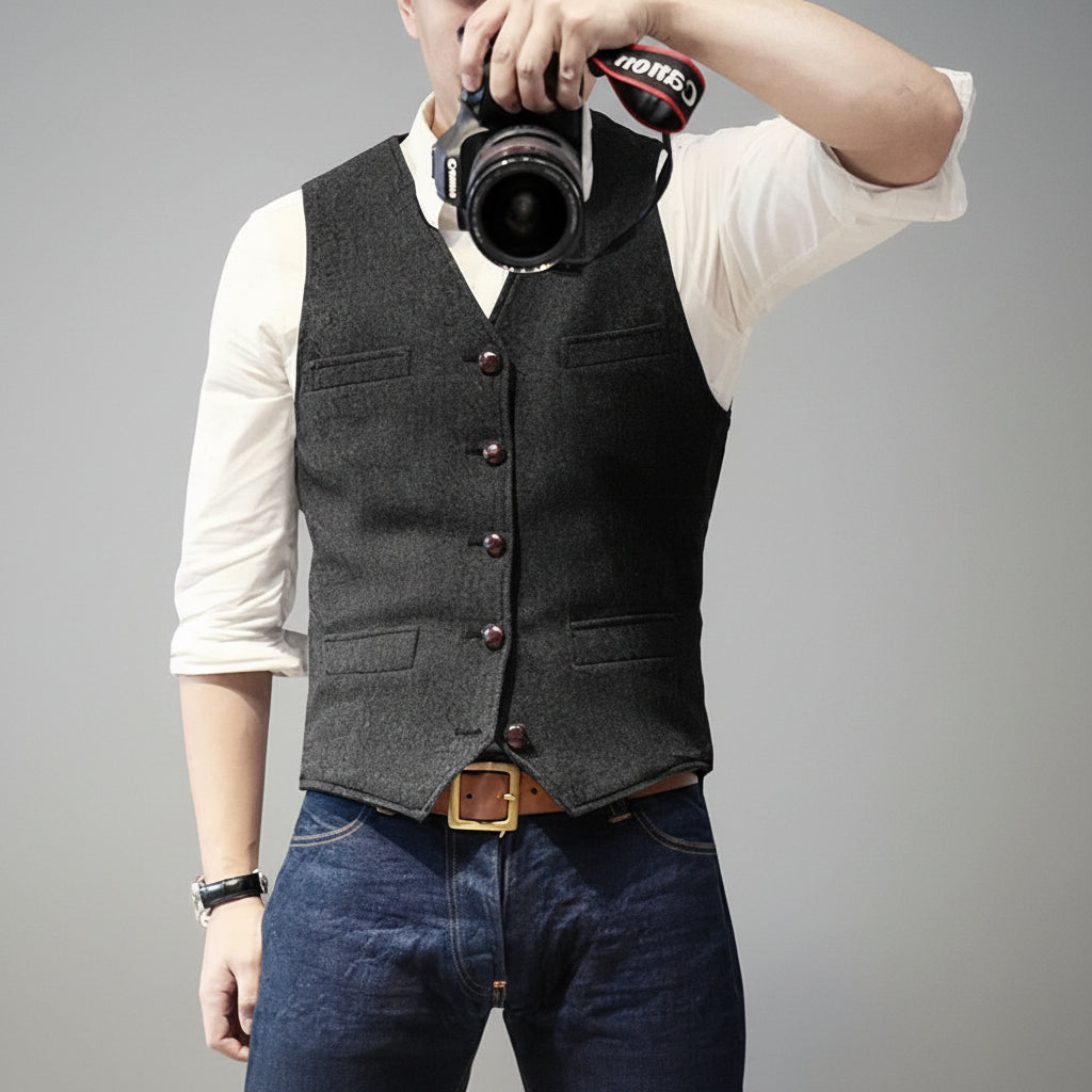 Sophisticated men's sleeveless vest for layering, ideal for a classic formal or smart casual look.