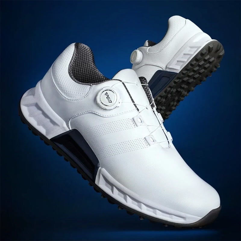 Athletic men's golf shoes, spikeless design providing superior traction and breathable comfort on the course.