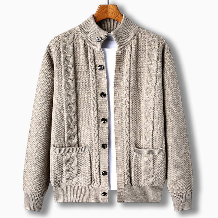 Cozy men's cable knit cardigan. Soft long-sleeve knitwear with stand collar for ultimate comfort.