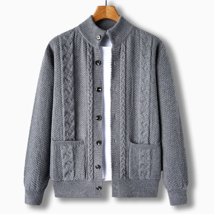 Warm men's cable knit cardigan for winter. Button-up with stand collar, great for layering & comfort.