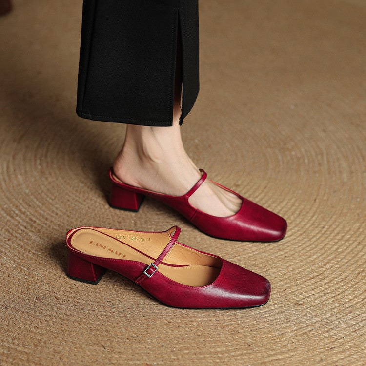 Womens Mary Jane mules with block heel, square toe, and stylish buckle strap.
