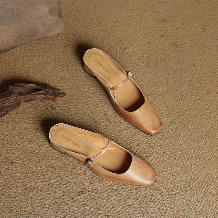 Practical slip-on Mary Jane mules for women, block heel, square toe, and a secure buckle.