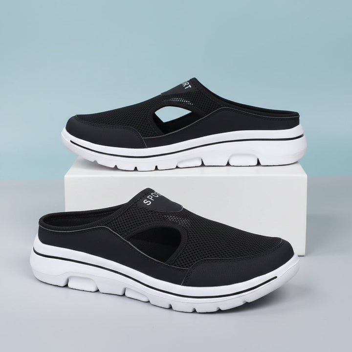 Mens orthopedic slip-on slippers with arch support for ultimate foot comfort & casual wear.