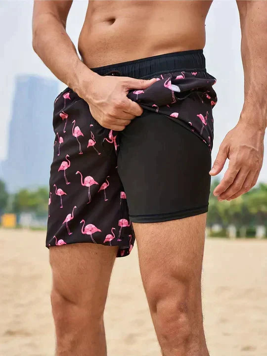 Stylish men's tropical print board shorts, ideal vacation wear for summer beach days.