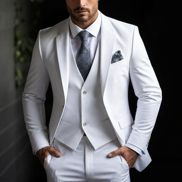 Full view of men's slim fit three-piece suit: jacket, vest, & trousers, a complete formal ensemble.